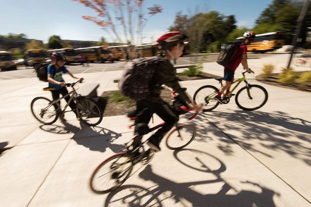 kids riding bikes at school