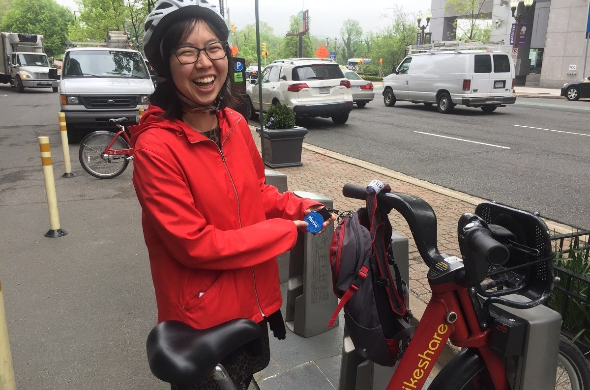 woman with Capital Bikeshare in Alrington