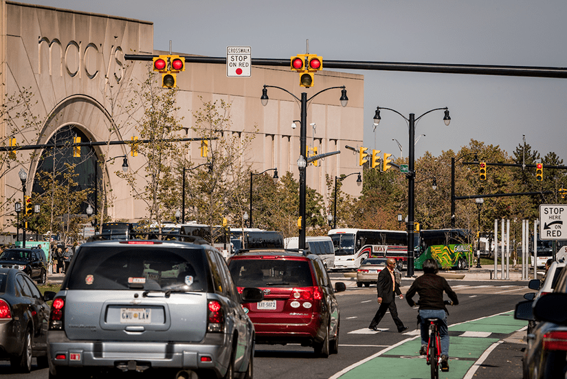 People biking and walking through an intersection in Arlington Virigina