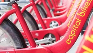 a close up of photo of a series of capital bike share bicycles