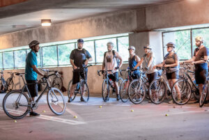People taking a bike class.