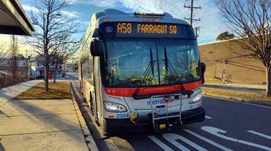 A picture of the A58 bus pulling up to the bus stop.