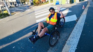 A person on a recumbent trike